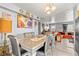 Chic dining room featuring a decorative chandelier, artwork, and furniture at 5004 Cannon Blvd, Las Vegas, NV 89108