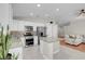 Modern kitchen featuring white cabinetry, stainless steel appliances, and granite countertops at 509 Regal Robin Way, North Las Vegas, NV 89084