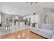 Spacious living area flows to the kitchen and dining, offering open-concept living with bright, neutral tones at 509 Regal Robin Way, North Las Vegas, NV 89084