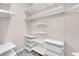The walk-in closet has adjustable shelves and drawers for great closet organization at 509 Regal Robin Way, North Las Vegas, NV 89084