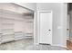 Walk-in closet with adjustable shelving and drawers for optimal storage solutions at 509 Regal Robin Way, North Las Vegas, NV 89084