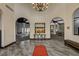 Foyer with tile floors, decorative lighting, and access to other community center areas at 5237 Crooked Sky Cir, Las Vegas, NV 89149