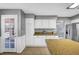 Well-equipped kitchen with white cabinets and backyard views at 5237 Crooked Sky Cir, Las Vegas, NV 89149