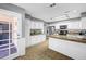 Spacious kitchen featuring white cabinetry and plenty of counter space for meal preparation at 5237 Crooked Sky Cir, Las Vegas, NV 89149
