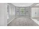 Open living room with new carpet at 5237 Crooked Sky Cir, Las Vegas, NV 89149