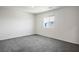 Bright bedroom featuring plush carpeting and a window with neighborhood views at 532 Clearsable Ave, Henderson, NV 89044