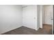 A clean bedroom shows the closet and door leading to the rest of the house at 532 Clearsable Ave, Henderson, NV 89044
