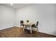 Cozy dining room featuring modern table set with stylish chairs and hardwood flooring at 532 Clearsable Ave, Henderson, NV 89044
