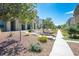 Well maintained front yard with beautiful plants, rock landscaping and stepping stone walkway at 532 Clearsable Ave, Henderson, NV 89044