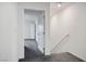 Hallway featuring carpeted floors and neutral walls leading to the stairway at 532 Clearsable Ave, Henderson, NV 89044