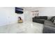 Cozy living room with a large sectional sofa and natural light at 5336 Regal Ave, Las Vegas, NV 89146