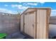 Wooden storage shed along the block wall in the backyard at 5336 Regal Ave, Las Vegas, NV 89146