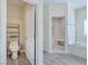 Bathroom features a toilet room and shower with marble surround at 5500 Santovito St, Pahrump, NV 89061