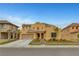 Charming two-story home with a landscaped front yard and neutral exterior paint at 5642 Breckenridge St, North Las Vegas, NV 89081