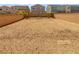 Large gravel backyard with privacy walls, providing a low-maintenance outdoor space at 5709 Jaysin Douglas St, North Las Vegas, NV 89031