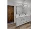 Bathroom features a double sink vanity and barn door at 5709 Jaysin Douglas St, North Las Vegas, NV 89031