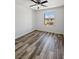 Bright bedroom features a large window at 5709 Jaysin Douglas St, North Las Vegas, NV 89031