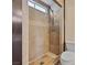Bathroom featuring tiled shower with glass door and rain shower faucet, toilet at 6436 Vinecrest Ave, Las Vegas, NV 89108