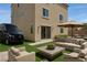 Comfortable backyard featuring artificial turf and an outdoor seating area at 6507 Creekside Cellars Ct, Las Vegas, NV 89139