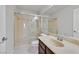 Bathroom featuring walk-in shower with glass door, modern vanity and fixtures at 6507 Creekside Cellars Ct, Las Vegas, NV 89139