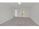 Clean and bright bedroom with doorways leading to hallway and bathroom at 6507 Creekside Cellars Ct, Las Vegas, NV 89139