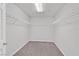 Empty walk-in closet with metal shelving at 6507 Creekside Cellars Ct, Las Vegas, NV 89139