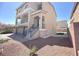 Two-story home with a three-car garage, and a low-maintenance yard at 6507 Creekside Cellars Ct, Las Vegas, NV 89139