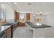Beautiful kitchen featuring stainless steel appliances, granite countertops, and ample cabinet space at 6507 Creekside Cellars Ct, Las Vegas, NV 89139
