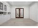Large flex room with custom built-ins and access to other rooms in the house at 6700 Regency Stone Way, Las Vegas, NV 89148