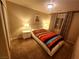 Cozy bedroom with a queen-size bed, side tables, and soft lighting at 6729 Flamenco Ct, Las Vegas, NV 89139