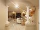 Open living area with stylish decor, marble flooring, decorative columns, and comfortable seating at 6729 Flamenco Ct, Las Vegas, NV 89139
