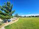 Lush green park with walking paths and mature trees perfect for relaxing or recreation at 6729 Flamenco Ct, Las Vegas, NV 89139