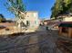 Spacious backyard with gravel, playhouse and low-maintenance landscaping at 6812 Dipper Ave, North Las Vegas, NV 89084