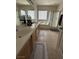 Bathroom featuring double sink vanity, tile floor, and tub at 6812 Dipper Ave, North Las Vegas, NV 89084