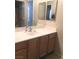 Bathroom sink with vanity and mirrors at 6812 Dipper Ave, North Las Vegas, NV 89084