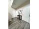 Inviting entryway with light gray vinyl flooring, and white doors on a sunny day at 6812 Dipper Ave, North Las Vegas, NV 89084