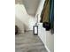 Inviting entryway with light gray vinyl flooring, and white doors and neutral walls at 6812 Dipper Ave, North Las Vegas, NV 89084