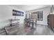 Dining room featuring a dining table with seating for six and modern decor at 7009 Rawlins Ct, Las Vegas, NV 89128