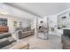 Spacious living room with fireplace, built-in shelving, and comfortable seating at 7009 Rawlins Ct, Las Vegas, NV 89128