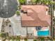Expansive backyard features a sparkling pool, patio, and well-manicured landscaping, creating a private outdoor oasis at 7427 Page Ranch Ct, Las Vegas, NV 89131