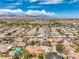 Residential area with neatly arranged homes, yards and neighborhood amenities at 7427 Page Ranch Ct, Las Vegas, NV 89131