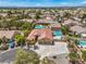 Charming home with a circular driveway, attached garage, and well-maintained landscaping, nestled in a desirable neighborhood at 7427 Page Ranch Ct, Las Vegas, NV 89131