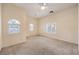Bright bedroom with shuttered windows and natural light, offering a serene living space at 7427 Page Ranch Ct, Las Vegas, NV 89131