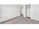 Carpeted bedroom with a closet at 7977 Whisper Words Ave, Las Vegas, NV 89113