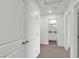 Hallway with doors leading to different rooms at 7977 Whisper Words Ave, Las Vegas, NV 89113
