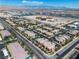 Scenic aerial view of a desert condo community with tree-lined streets and convenient covered parking at 8000 Badura Ave # 2174, Las Vegas, NV 89113