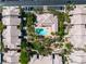 Bird's-eye view of a residential community featuring a pool, trees, and well-maintained landscaping at 8000 Badura Ave # 2174, Las Vegas, NV 89113
