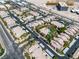 High-angle view of an apartment complex with a pool, trees, carports, and neatly arranged buildings at 8000 Badura Ave # 2174, Las Vegas, NV 89113