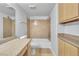 Bathroom features vanity with sink, mirror with lighting, and toilet and shower area at 8000 Badura Ave # 2174, Las Vegas, NV 89113