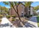 Attractive building exterior with manicured landscaping at 8000 Badura Ave # 2174, Las Vegas, NV 89113